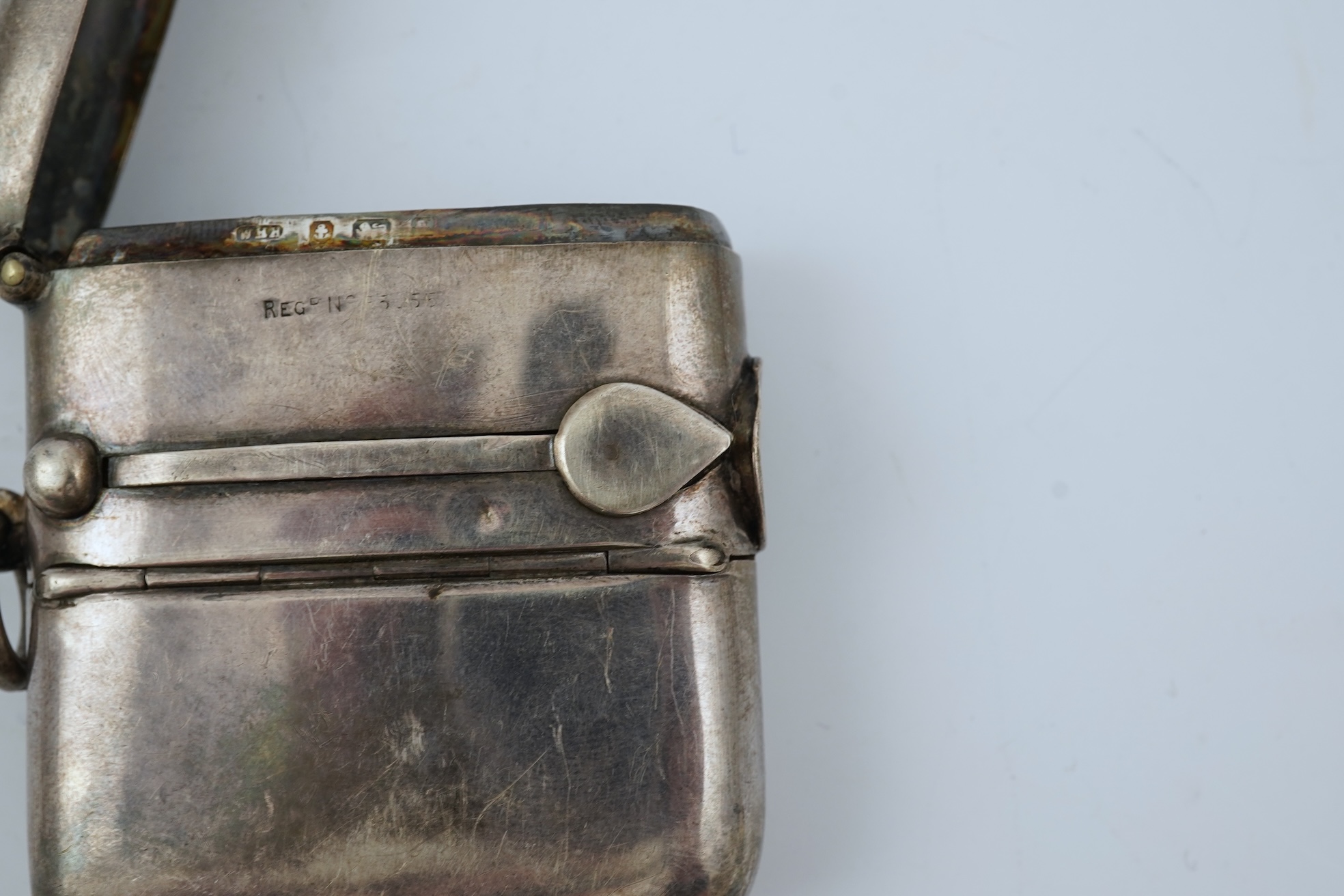A late Victorian silver combination, cigar cutter, sovereign/half sovereign and vesta case by William Hair Haseler
